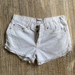 BDG Mid Rise white denim shorts, size 28